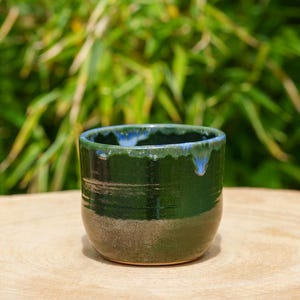 Metallic green ceramic bowl. Green stoneware bowl.