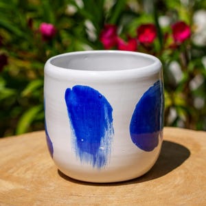 White and blue ceramic pot. Blue and white stoneware planter.