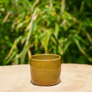 Small olive green ceramic pot. Green ramekin in handmade pottery.