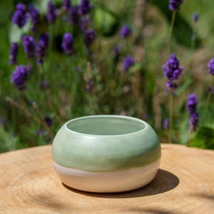 Green and white stoneware ceramic ball pot. Pastel green trinket dish. Small green stoneware ceramic pot. Handmade pottery.