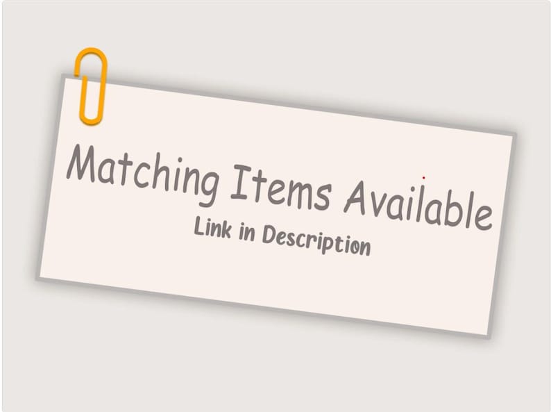 May include: A light beige sticky note with the text "Matching Items Available" and "Link in Description" in a handwritten style font. The note is held by a yellow paper clip.