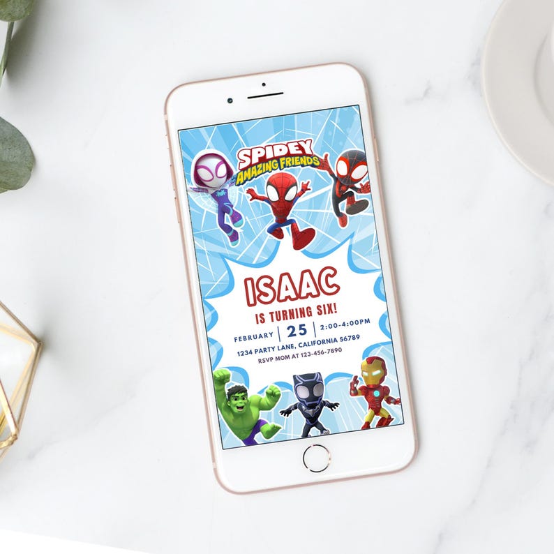 May include: A smartphone screen shows a birthday party invitation. The invitation features the text "Spidey Amazing Friends" and "Isaac is turning six!" with cartoon characters. The date is February 25th, with a time and RSVP information.