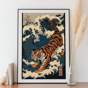 May include: A framed print of a tiger emerging from a wave, inspired by traditional Japanese woodblock prints. The tiger is orange and black with white stripes, and the wave is blue and white. The print is set against a beige background and includes the Japanese characters "龍虎" (Ryuko) which means "Dragon Tiger".