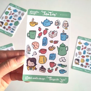 May include: A sheet of colorful stickers featuring a tea time theme. The stickers include images of teacups, teapots, tea bags, cookies, cake, and strawberries. The sheet is labeled "Tea Time" and "#S0001".