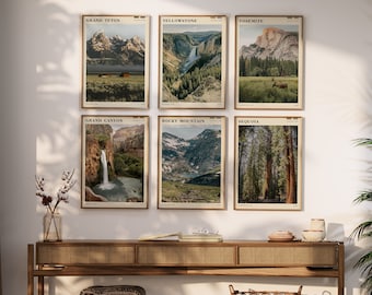 May include: Six framed prints of national parks in the United States. The prints feature scenic landscapes of Grand Teton, Yellowstone, Yosemite, Grand Canyon, Rocky Mountain, and Sequoia.