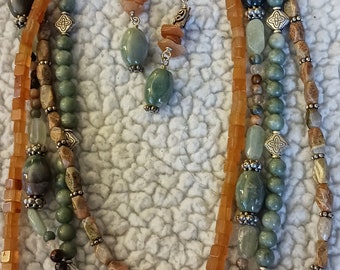 Fluorite, Carnelian, Jasper,  4-Strand Necklace with decorative Clasp and matching earrings.