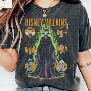 May include: A set of three ceramic mugs with a speckled, matte finish in cream, light grey, and dark grey. Each mug has a simple, minimalist design, suitable for coffee or tea.