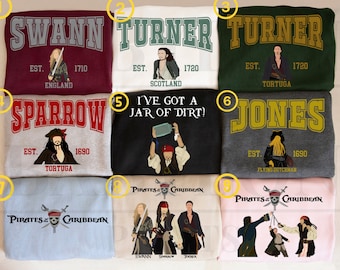 May include: Nine different sweatshirts featuring characters and text from the Pirates of the Caribbean movie franchise. The sweatshirts are in various colors, including maroon, white, green, gray, black, and pink. The text on the sweatshirts includes "Swann", "Turner", "Sparrow", "Jones", "I've got a jar of dirt!" and "Pirates of the Caribbean".