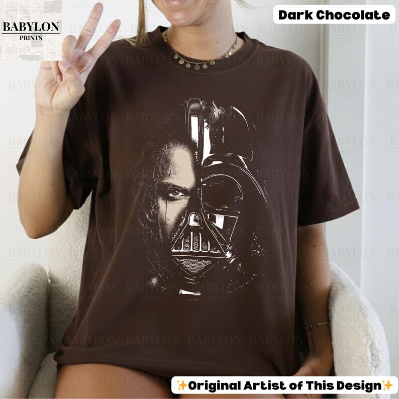 May include: A white ceramic mug with a black handle and the text "But First, Coffee" in a bold, black font. The mug is set against a blurred background, suggesting a cozy setting. The mug appears to be approximately 4 inches tall.