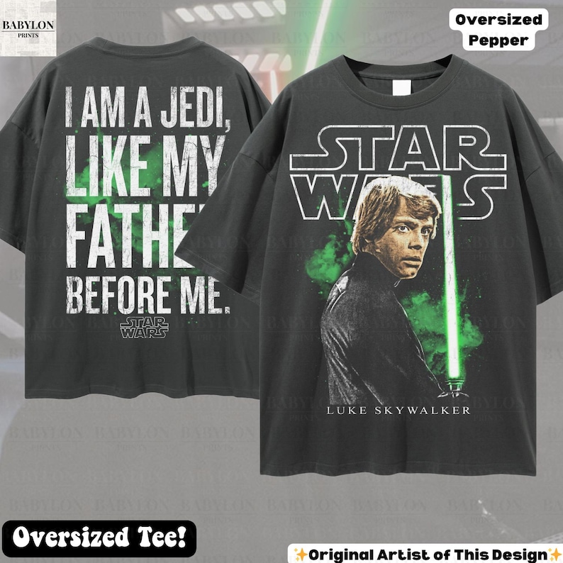 May include: Dark gray oversized t-shirt featuring Luke Skywalker with a green lightsaber and the Star Wars logo. The back of the shirt displays the text "I AM A JEDI, LIKE MY FATHER BEFORE ME." The shirt is labeled "Oversized Tee!"