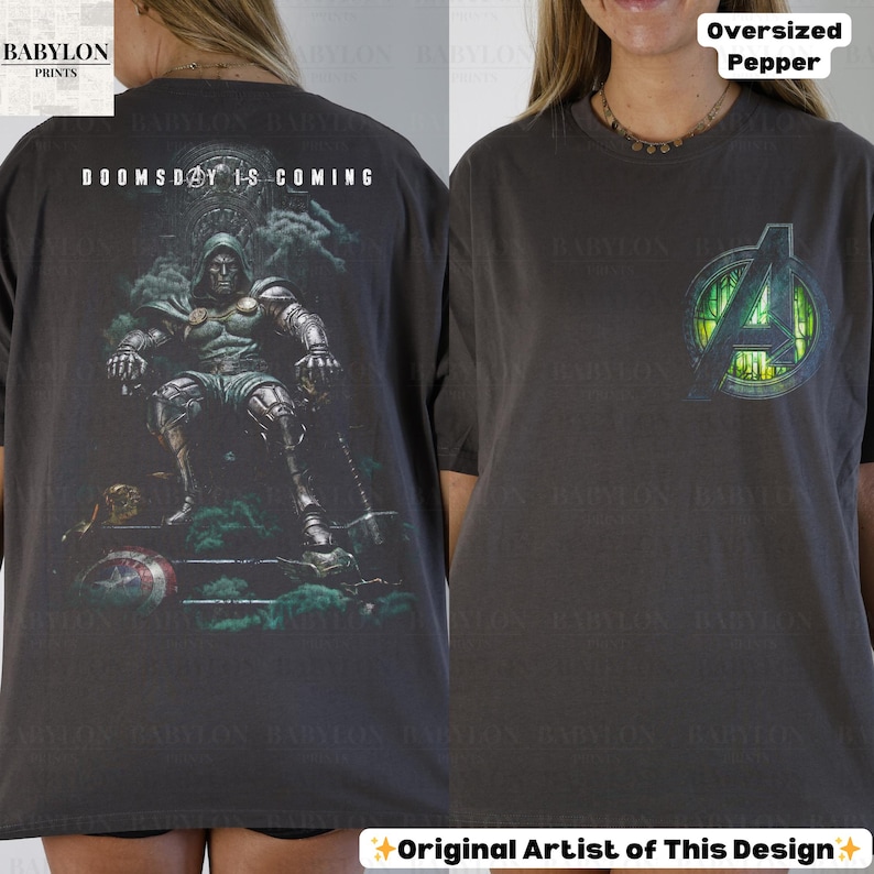 May include: Dark gray oversized t-shirt with a graphic of a seated armored figure and the text "DOOMSDAY IS COMING" on the back. The front features the Avengers logo. The shirt is labeled "Oversized Pepper".