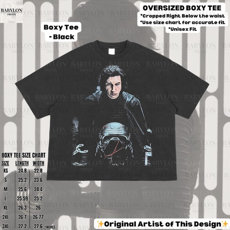 May include: Black boxy tee with a portrait of a person with a helmet. The shirt has the text "Boxy Tee - Black" and "Oversized Boxy Tee" with a size chart. The design is labeled as "Original Artist of This Design".