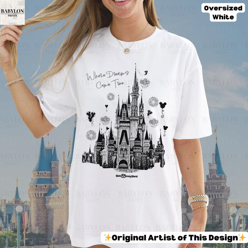May include: White oversized t-shirt with a black and white castle illustration and the words "Where Dreams Come True." The design includes "Walt Disney World" text. The top of the shirt has the words "Oversized White".