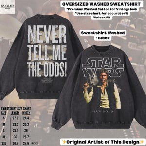 Puede incluir: Sudadera negra lavada de gran tama&ntilde;o con el texto "NEVER TELL ME THE ODDS!" en la espalda y un gr&aacute;fico de Star Wars con Han Solo en la parte delantera. Fabricada en algod&oacute;n lavado de primera calidad. Corte unisex. Ver tabla de tallas para medidas en cm.