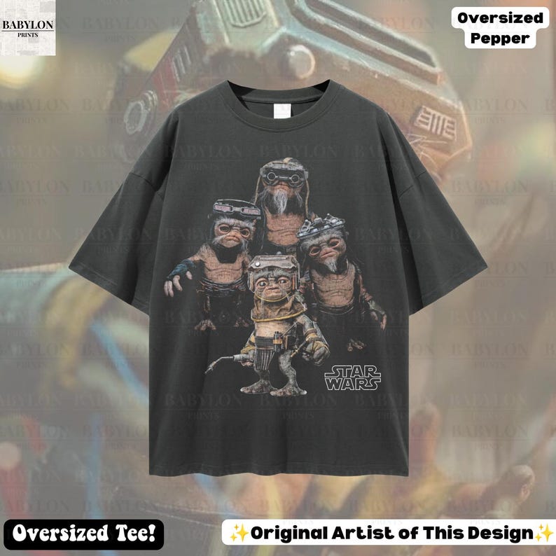 May include: A charcoal gray oversized t-shirt featuring a graphic print of four Babu Frik characters from Star Wars. The characters are depicted in a group, with one in the foreground holding a tool. The Star Wars logo is printed in white.