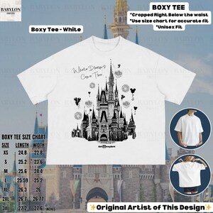 May include: White boxy tee with a black and white castle illustration and the text "Where Dreams Come True." The size chart provides measurements in inches. The design is labeled as "Original Artist of This Design."