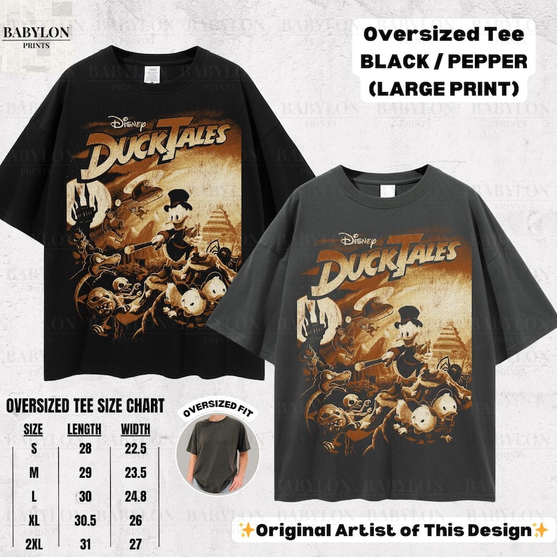 May include: Black and pepper-colored oversized tee shirts with a large print of the Disney DuckTales cartoon. The shirts have the DuckTales logo and characters. A size chart is also included.