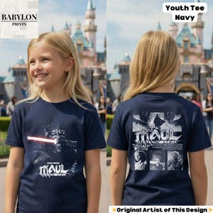 May include: Navy blue youth tee featuring a Star Wars graphic of Darth Maul with a red lightsaber. The shirt has the text "MAUL SHADOW LORD" and the words "Youth Tee Navy" are printed on the top right corner.