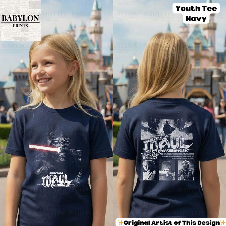 May include: Navy blue youth tee featuring a Star Wars graphic of Darth Maul with a red lightsaber. The shirt has the text "MAUL SHADOW LORD" and the words "Youth Tee Navy" are printed on the top right corner.