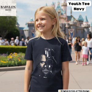 May include: A white ceramic mug with a black handle and the text "But First, Coffee" in a bold, black font. The mug is set against a blurred background, suggesting a cozy setting.