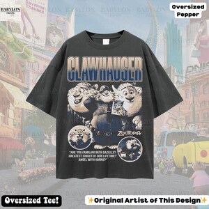 May include: Dark gray oversized t-shirt featuring a graphic of Clawhauser from Zootopia. The design includes the text "Clawhauser" and the Zootopia logo. Additional text reads "Are you familiar with Gazelle? Greatest singer of our lifetime? Angel with horns?"