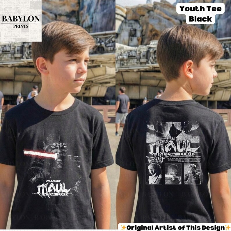 May include: Black youth tee featuring a Star Wars design. The front graphic shows Darth Maul with a red lightsaber and the text "MAUL SHADOW LORD." The back displays a larger image of Darth Maul and additional character portraits.