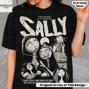 May include: Black oversized t-shirt featuring a graphic of Sally from "The Nightmare Before Christmas." The design includes multiple images of Sally with the film's title in large, distressed white letters. Text at the bottom reads, "I sense there's something in the wind..."