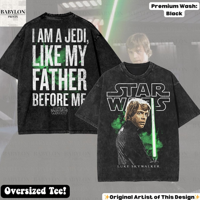 May include: Black oversized tee featuring Luke Skywalker with a green lightsaber and the Star Wars logo. The back of the shirt displays the text "I AM A JEDI, LIKE MY FATHER BEFORE ME" in white. The shirt is labeled "Premium Wash: Black".