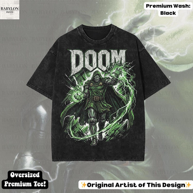 May include: Black oversized premium tee featuring a graphic of a character with the word "DOOM" in white. The character is in green and silver with green lightning effects. The shirt has the text "Original Artist of This Design".