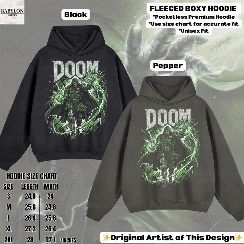 May include: Black and pepper-colored fleece boxy hoodies with a DOOM graphic. The design features a character with green energy effects. The hoodies have a pocketless design and are available in unisex sizes. The size chart is included in the image.