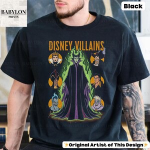May include: Black t-shirt with the words "DISNEY VILLAINS" and a graphic of various Disney villains, including Maleficent and Ursula. The shirt also has the text "Original Artist of This Design".