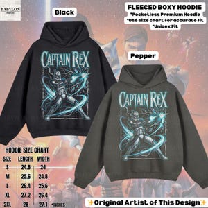 May include: Black and pepper-colored fleece boxy hoodies with a Captain Rex graphic. The graphic features a soldier with blue energy effects. The hoodies have a pocketless design and are available in sizes S to 2XL. The size chart shows the length and width in inches.
