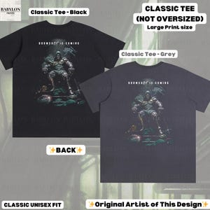 May include: Black and grey classic unisex fit t-shirts with a large print design. The design features a warrior figure with the text "DOOMSDAY IS COMING". The shirts are labeled "Classic Tee" and "Original Artist of This Design".