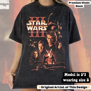 May include: Black Star Wars III: Revenge of the Sith graphic t-shirt. The design features characters and the movie title in red. The shirt is a size S and the model is 5'7.