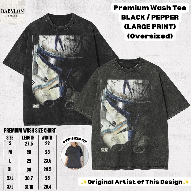 May include: An oversized black and pepper premium wash t-shirt featuring a large graphic print of a weathered white and blue clone trooper helmet. The shirt includes the text Premium Wash Tee BLACK / PEPPER (LARGE PRINT) (OVERSIZED).