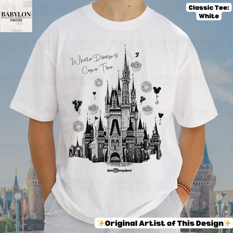 May include: White classic tee with a black and white castle illustration, the text "Where Dreams Come True", and "Walt Disney World". The shirt also has the text "Original Artist of This Design".