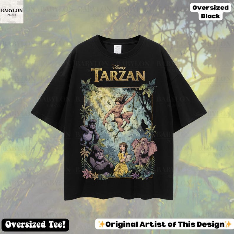 May include: Black oversized t-shirt featuring a colorful graphic of Disney's Tarzan. The design includes Tarzan, gorillas, an elephant, and Jane. The text "Disney Tarzan" is at the top. The shirt also has the text "Oversized Tee!" and "Original Artist of This Design".