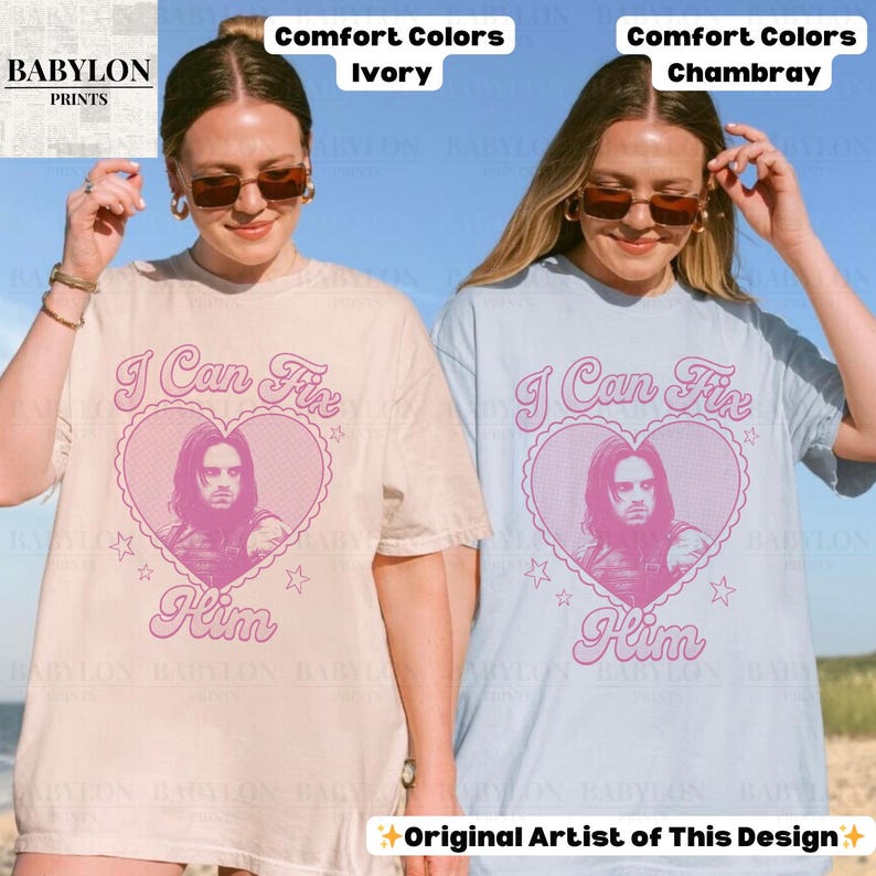 May include: Two t-shirts, one ivory and one chambray, each with a pink heart design featuring a portrait and the text "I Can Fix Him." The design includes stars and the words "Him." The shirts are from Babylon Prints.