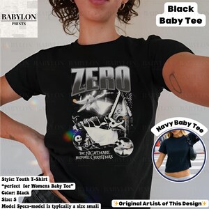 May include: Black youth t-shirt featuring a graphic from "The Nightmare Before Christmas" with the word "ZERO" above the image. The shirt includes the text "The Nightmare Before Christmas".