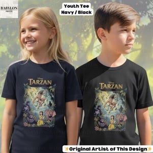May include: Two youth t-shirts, one navy blue and one black, featuring a Disney Tarzan graphic. The graphic includes Tarzan, Jane, and various jungle animals. The text "Youth Tee Navy/Black" is at the top. The text "Original Artist of This Design" is at the bottom.