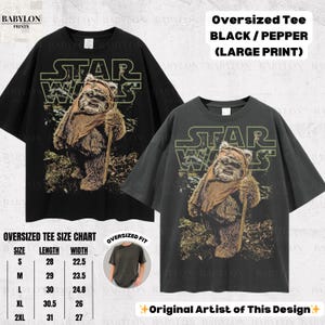 May include: Black and pepper-colored oversized t-shirts featuring a large print of a Star Wars Ewok character. The shirts have the Star Wars logo above the character. A size chart is included.