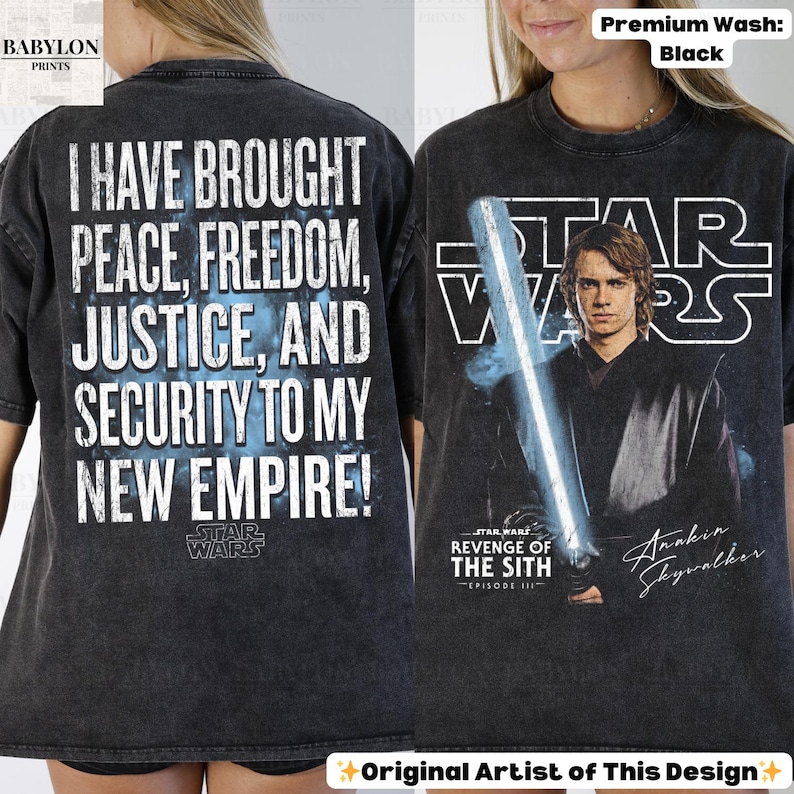 May include: Black Star Wars t-shirt featuring Anakin Skywalker with a lightsaber and text from Revenge of the Sith. The back of the shirt displays the quote "I HAVE BROUGHT PEACE, FREEDOM, JUSTICE, AND SECURITY TO MY NEW EMPIRE!"