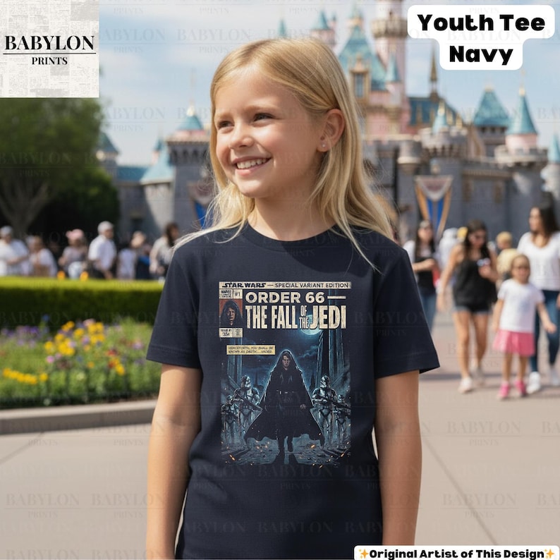 May include: A navy blue youth tee featuring a Star Wars comic book cover design. The graphic reads "Star Wars Special Variant Edition Order 66 The Fall of Jedi". The shirt is worn by a young person in front of a castle.