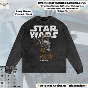 Puede incluir: Camiseta negra de manga larga con un gr&aacute;fico de Star Wars con el personaje Embo. La camiseta tiene un aspecto vintage lavado y el texto "STAR WARS" en blanco. La camiseta es unisex y est&aacute; hecha de algod&oacute;n lavado de primera calidad. Tabla de tallas incluida.