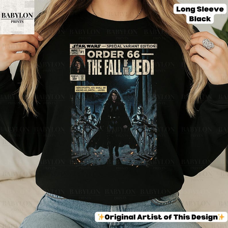 May include: Black long-sleeve shirt featuring a Star Wars comic book cover design. The graphic reads "Star Wars - Order 66 - The Fall of the Jedi." The artwork depicts Darth Vader and stormtroopers. The shirt has the text "Long Sleeve Black".