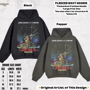 May include: Black and pepper-colored fleeced boxy hoodies with a Star Wars graphic. The graphic includes Japanese text and a movie poster design. The size chart shows measurements in inches. Unisex fit.