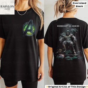 May include: Black oversized t-shirt featuring the Avengers' logo on the front and a graphic of a character with the text "DOOMSDAY IS COMING" on the back. The shirt is a comfortable, casual style.