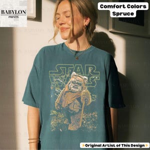 May include: A set of three ceramic mugs with a speckled, matte finish. The mugs are in shades of cream, light gray, and dark gray. Each mug has a simple, modern design and a rounded handle.