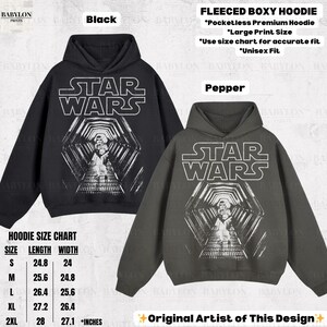 May include: Black and pepper-colored fleeced boxy hoodies with a Star Wars graphic. The hoodies feature a large print design and are available in various sizes. The size chart shows the length and width in inches.