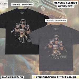 May include: A black and a grey short-sleeved t-shirt, each featuring a graphic print of four Ewok characters from Star Wars. The shirts have a crew neckline and a classic fit. Text on the shirts includes Classic Tee - Black, Classic Tee - Grey, and Star Wars.